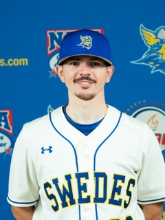 Conner in the Swedes baseball uniform smiling