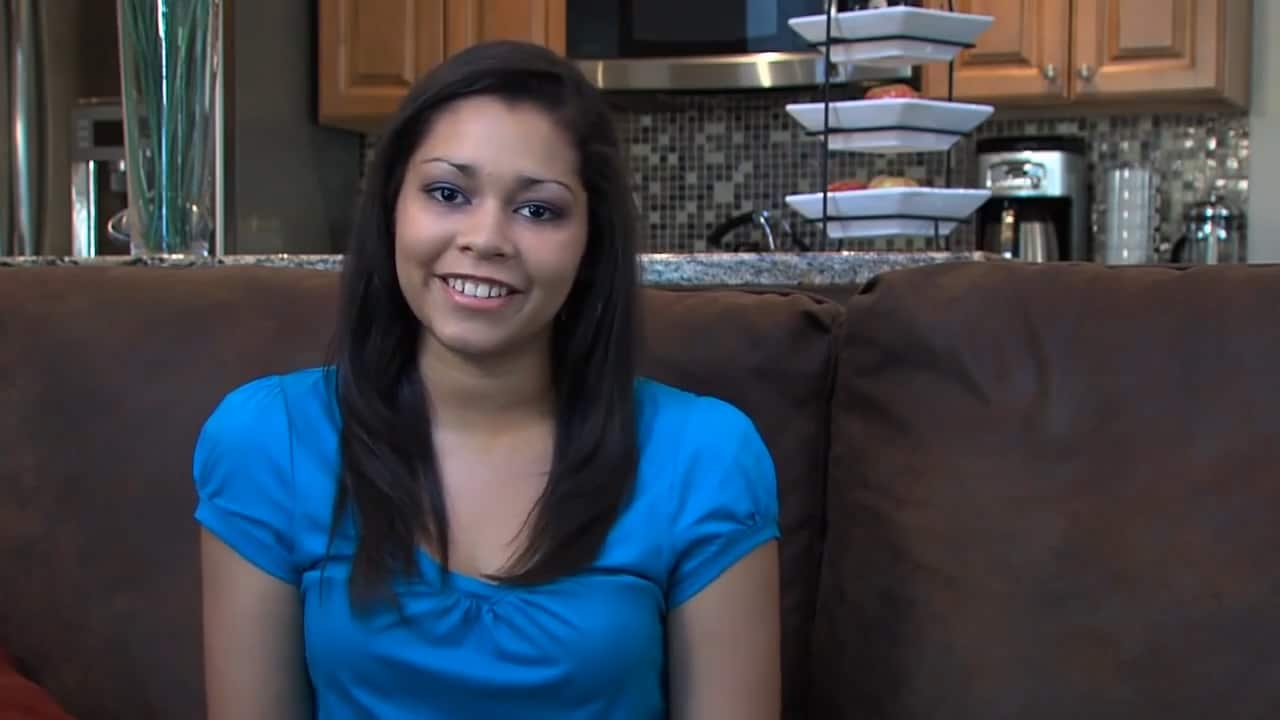 A learning coach in a blue shirt