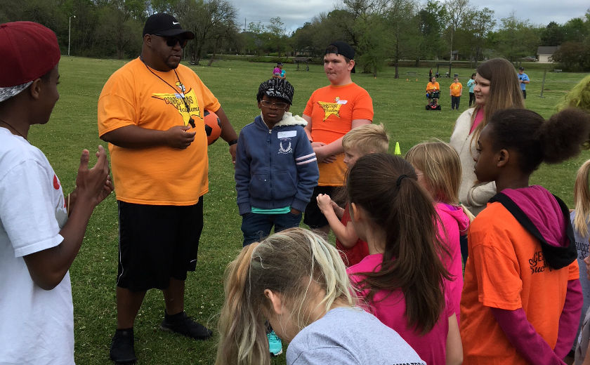 Mr. Moorer organizes a soccer game for ALCA students