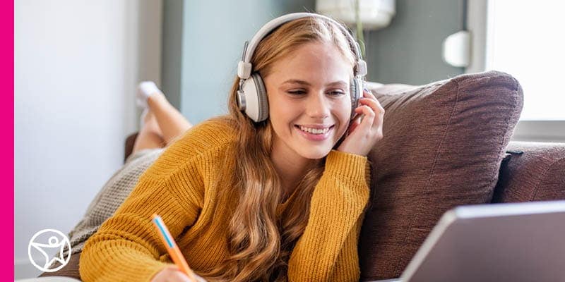 Young teen in a yellow sweater